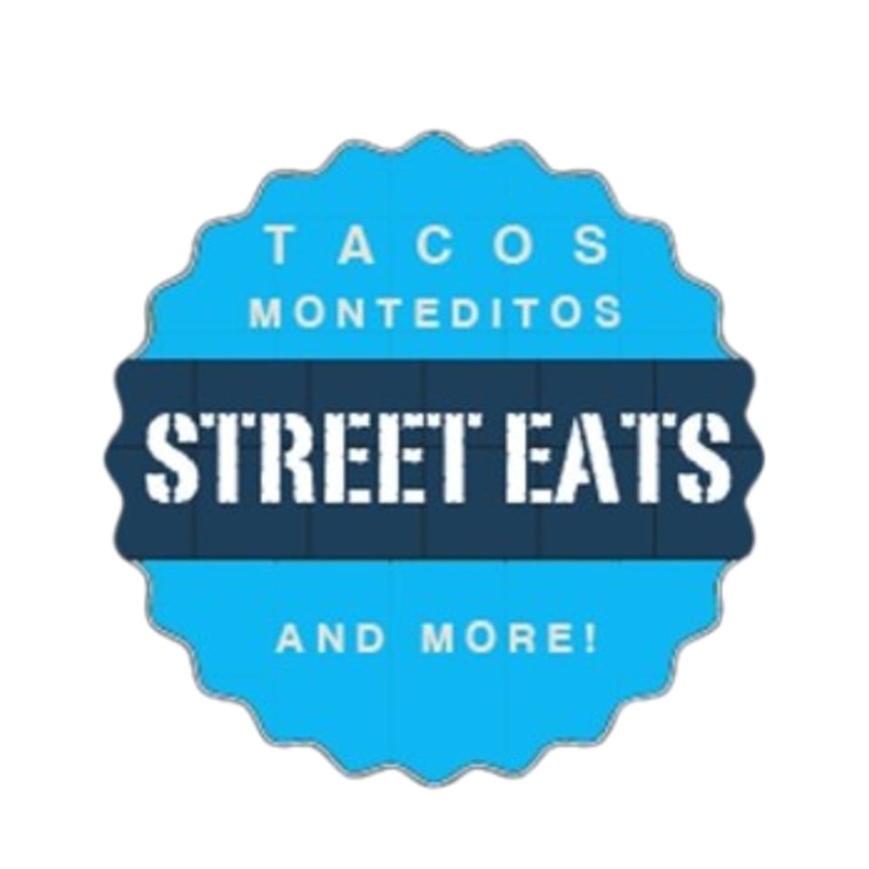 Blue and dark blue scalloped badge with "TACOS MONTEDITOS STREET EATS AND MORE!" text.